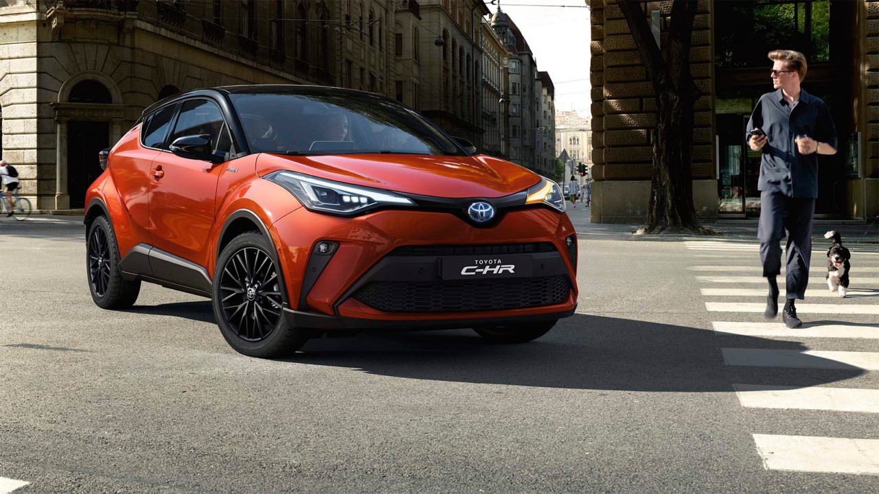 Model shown is Hybrid C-UERO in bi-tone orange with black roof (2TC )	